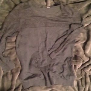 Two quarter sleeve blue/grey shirt.